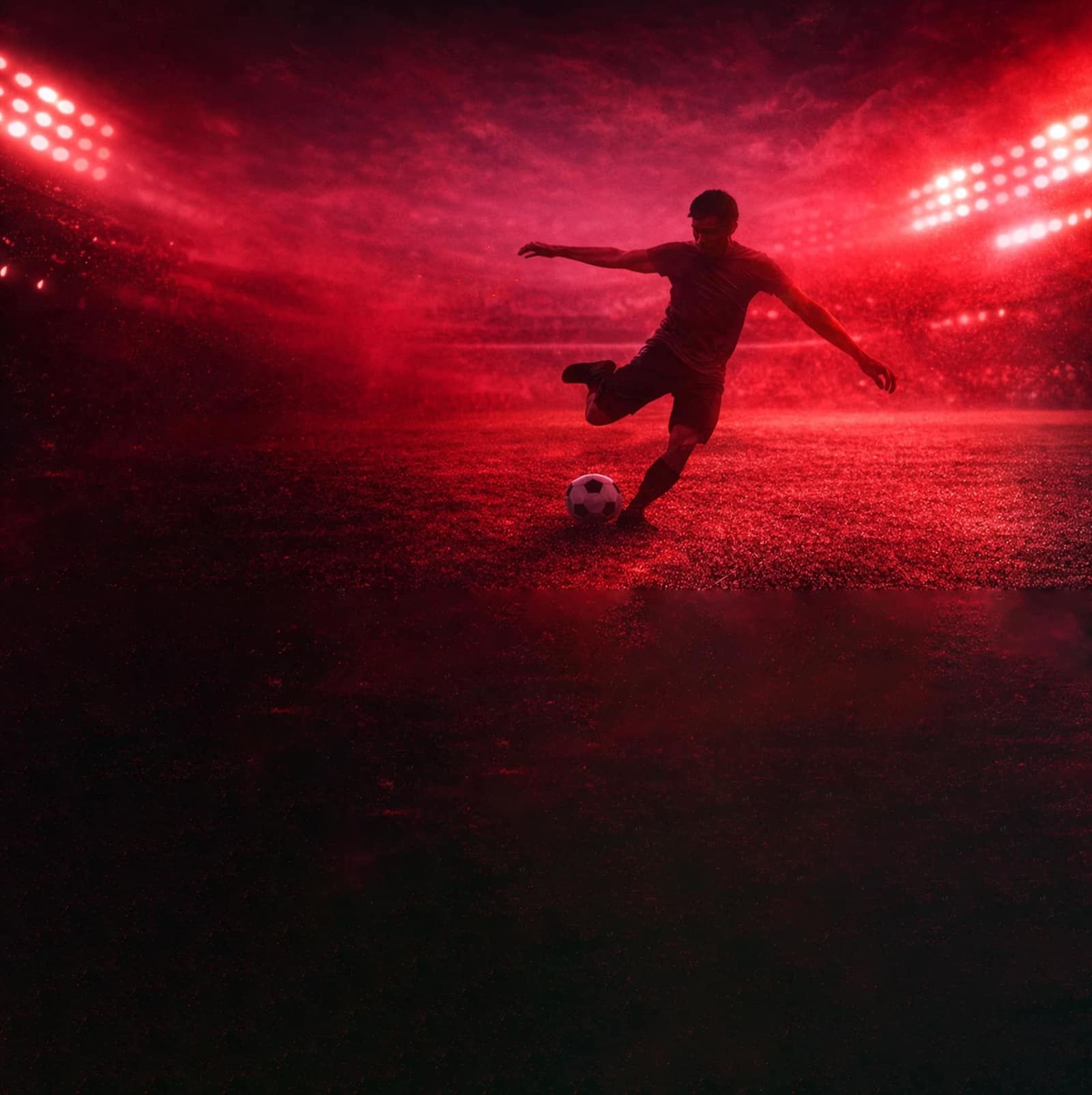 Jugador de fútbol en estadio iluminado